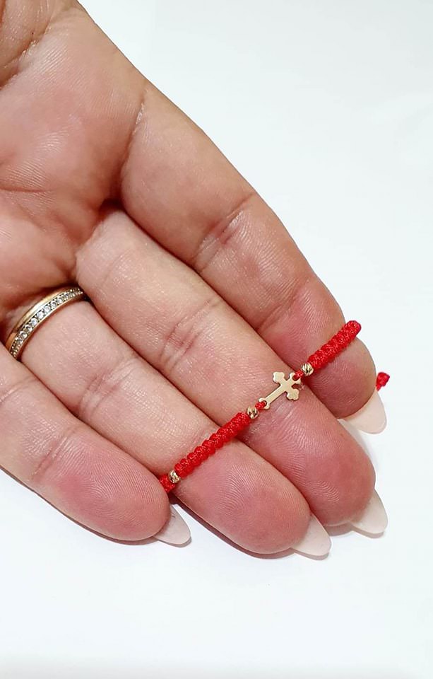 Small cross on cord +4 beads 2.5mm