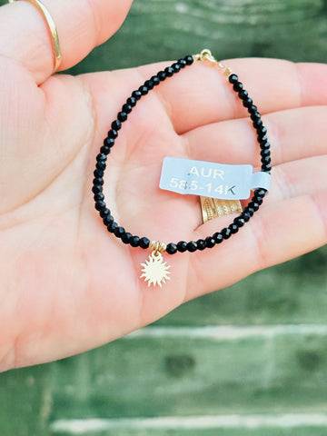 Crystal bracelet + 2 beads 2.5mm + Sun pendant - 14 ct gold