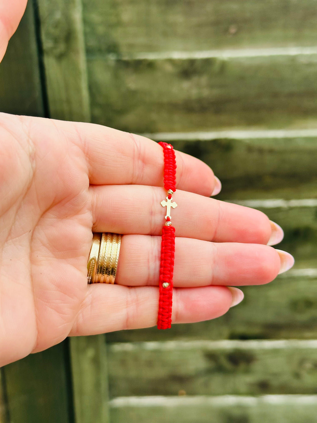 Small cross on cord +4 beads 2.5mm